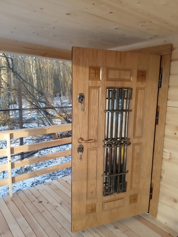 Утепленная дверь с ковкой Утепленная дверь с ковкой