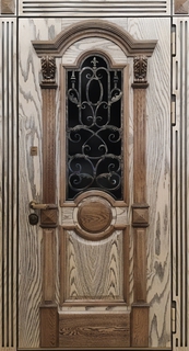 Входная остекленная термодверь с МДФ шпон, резьбой и ковкой Входная остекленная термодверь с МДФ шпон, резьбой и ковкой